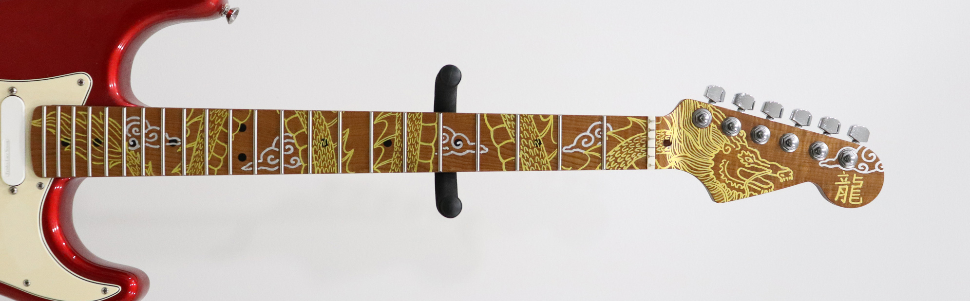 dragon design on guitar neck